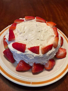 A picture of Johnny Cash inspired Strawberry Cake.