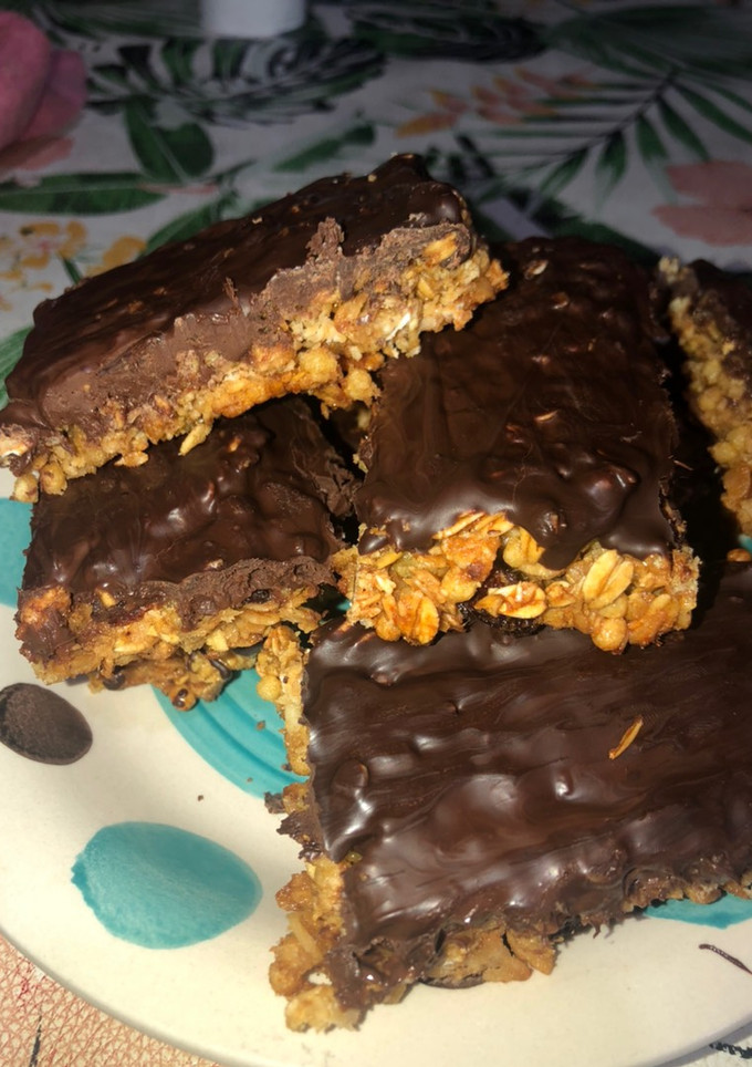 Una foto de Barrita de cereal con baño de chocolate 🍫