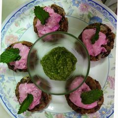 A picture of Rajma Galouti Kebab with beetroot dip.
