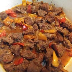 A picture of Jerk pork shoulder with rice.