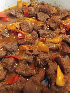 A picture of Jerk pork shoulder with rice.