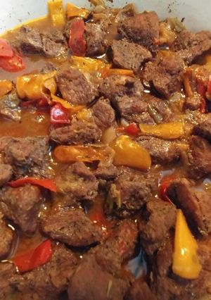 A picture of Jerk pork shoulder with rice.
