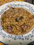 Lentilles jaunes au lard, courgette et tomates