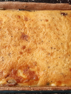 Una foto de Tarta integral de hongos y cebollas
