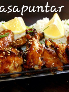 Una foto de Alitas de pollo thai