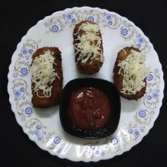 A picture of Poha pizza rolls.