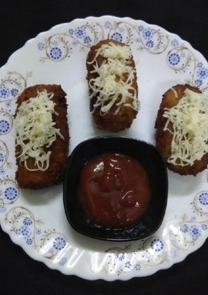 A picture of Poha pizza rolls.