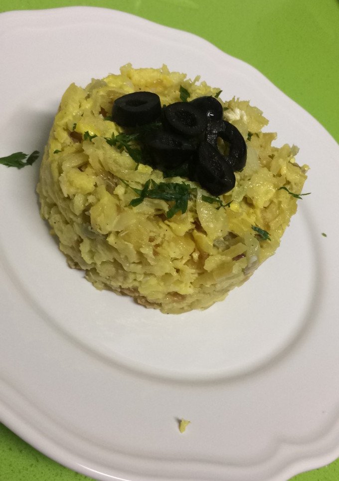 Una foto de Bacalao dorado a la portuguesa