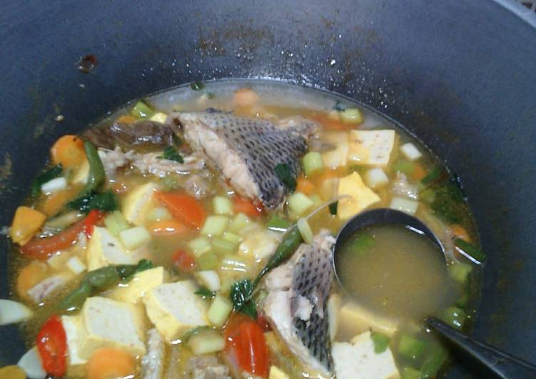Bagaimana Menyiapkan Sup ikan kakap tahu kuning yang Sempurna