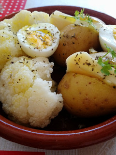 Una foto de Coliflor con patata al ajo