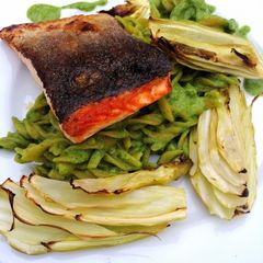 A picture of Pan roasted salmon/lentil pasta, green pesto and roasted fennel.