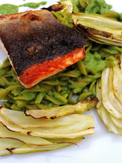 A picture of Pan roasted salmon/lentil pasta, green pesto and roasted fennel.