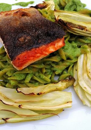 A picture of Pan roasted salmon/lentil pasta, green pesto and roasted fennel.