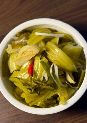 A picture of Pickled Mustard Greens | Dưa Cải Chua.
