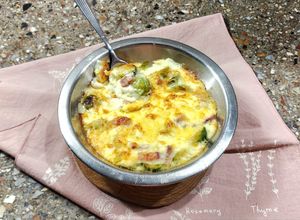 Una foto de 👵🏻Repollitos de Bruselas con panceta, salsa blanca y queso, al horno 👵🏻Receta de la abuela Coca❤