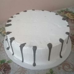 Icing the cake n trying out on chocolate drips#authormarathon A picture of Icing the cake n trying out on chocolate drips#authormarathon.