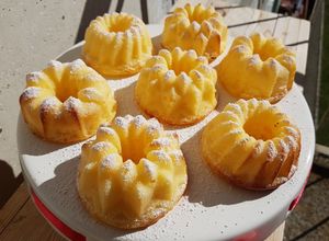 O poză a rețetei Papanași cu brânză la cuptor.