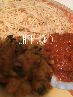 A picture of Spaghetti/ porridge yam and beef stew.