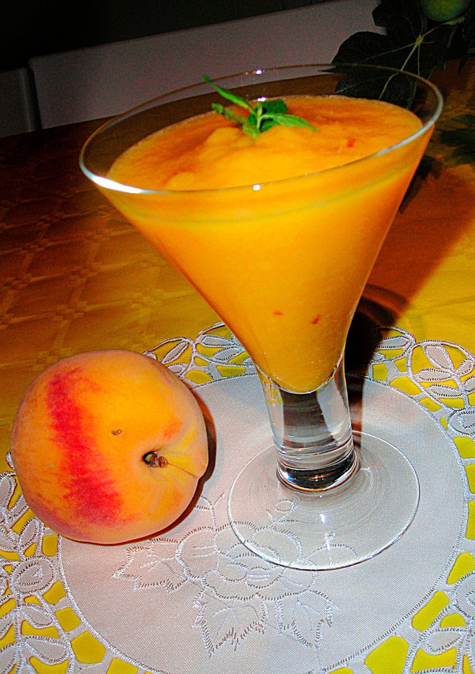 Una foto de Néctar de melocotón con naranja - fácil