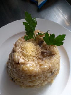 Una foto de Risotto con pollo y champiñones
