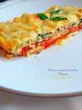 Tomates con huevos, cebollas y atún con costra de queso