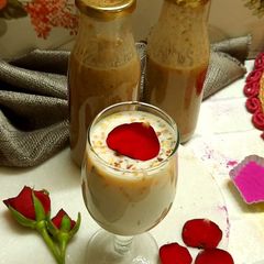 A picture of Thandai Milk and Thandai Syrup.