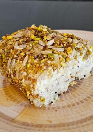 Una foto de Tronco de queso y salmón