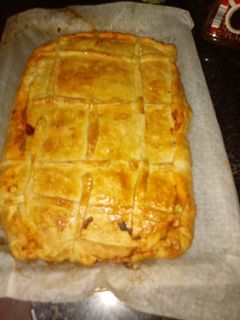 Una foto de Empanada gallega a mi manera
