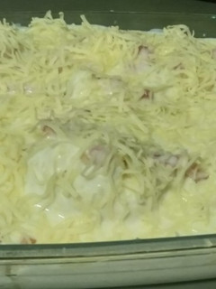 Una foto de Coliflor con bacon y bechamel