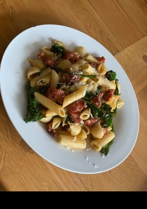 A picture of Pasta with Italian sausage & tender stem broccoli.