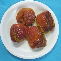 A picture of Stuffed tomato.