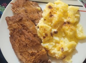 Una foto de Solomillo de cerdo al horno con papas a la crema