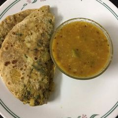 A picture of North Indian style Aloo Gobi Methi Stuffed Paratha.