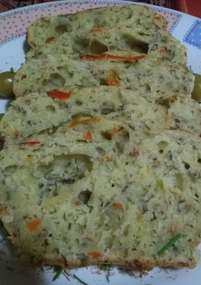 Una foto de Pan de queso y aceitunas