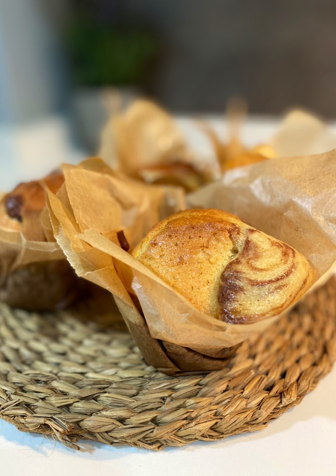 Una foto de Muffins marmolados de vainilla y chocolate