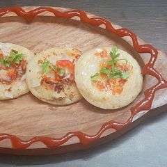Mini suji uttapam A picture of Mini suji uttapam.