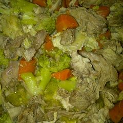 A picture of Pork Carrots and broccoli.