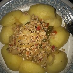 A picture of Boiled Irish potatoes with scrambled eggs.