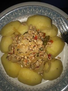 A picture of Boiled Irish potatoes with scrambled eggs.