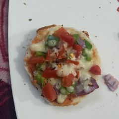 A picture of Mini bread pizza.