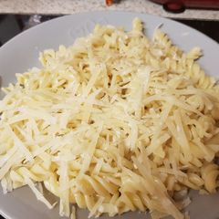 A picture of My Nice Light Mozzarella pasta &sprinkled Parmesan Cheese grated.