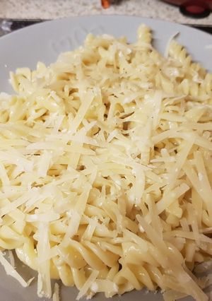 A picture of My Nice Light Mozzarella pasta &sprinkled Parmesan Cheese grated.