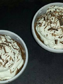 Una foto de Mousse de chocolate con nata