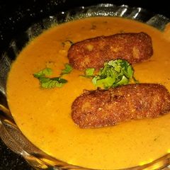 Malai kofta in gravy A picture of Malai kofta in gravy.