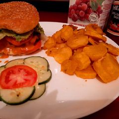 A picture of Burger served with bhajias.