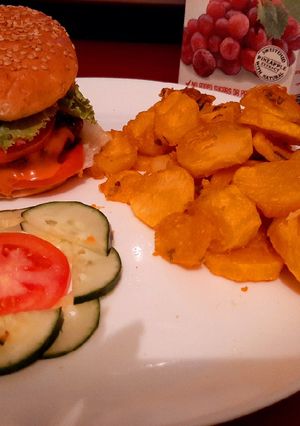 A picture of Burger served with bhajias.