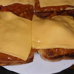 A picture of My cheese curry baked beans on toast.