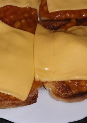 A picture of My cheese curry baked beans on toast.