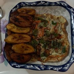 A picture of Plantain and fried egg.