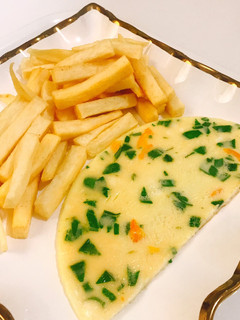 A picture of Yam fries and omelette.